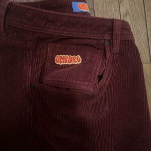 reddish purple corduroy pants